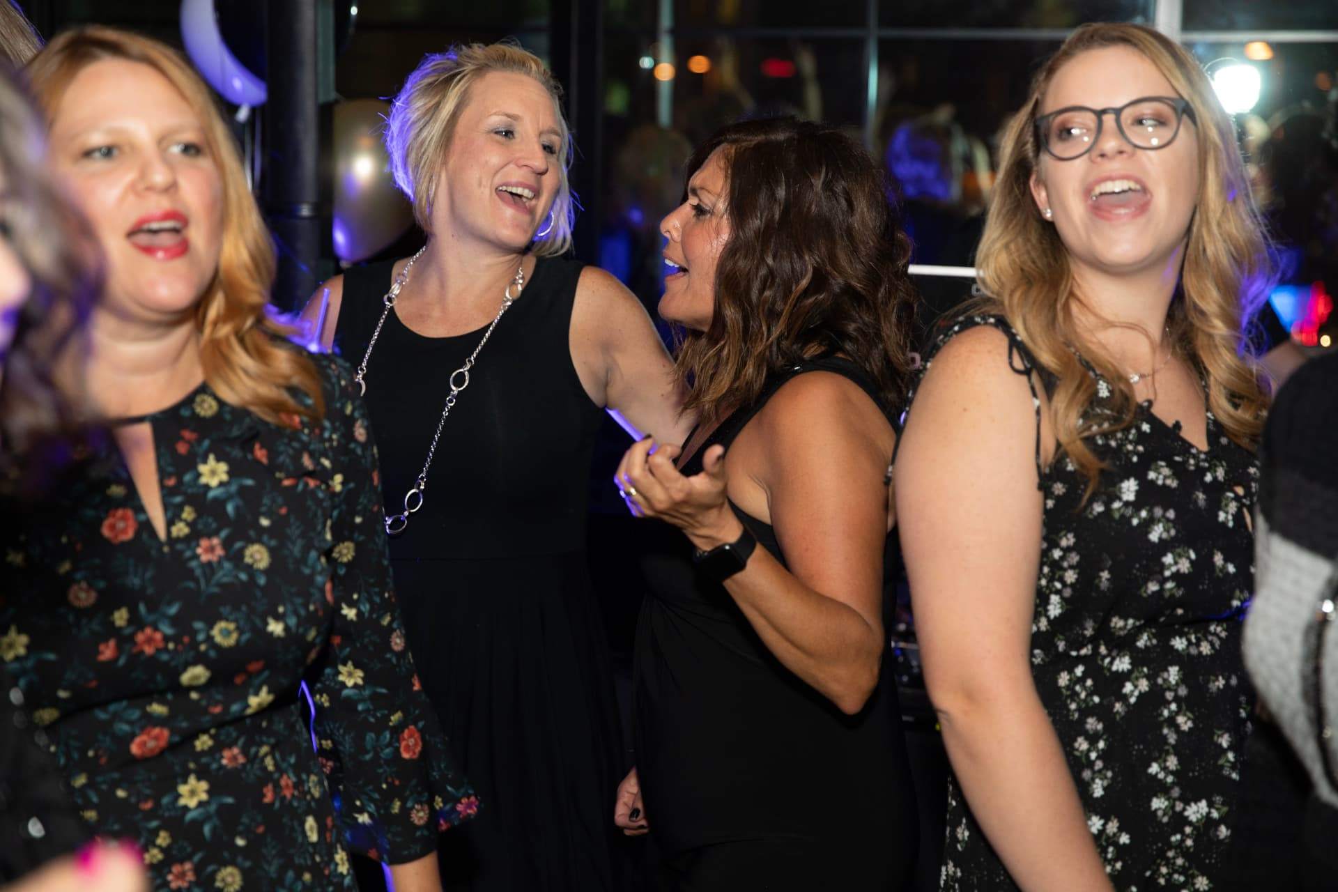 Members celebrating at the Little Black Dress Party
